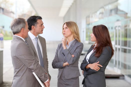 Business people meeting at an exhibition