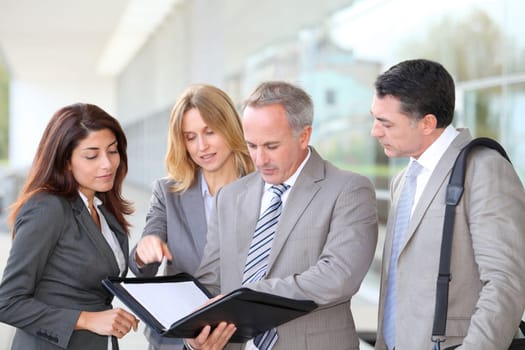 Business people meeting at an exhibition