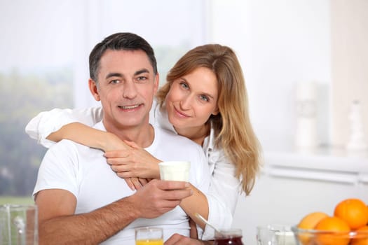 Couple having breakfast during the week end
