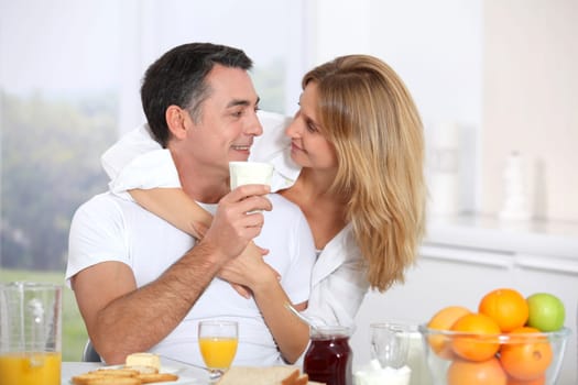 Couple having breakfast during the week end
