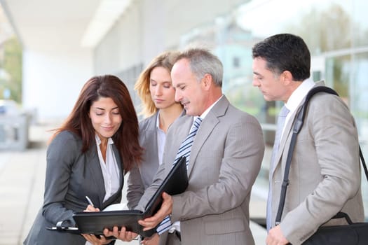 Business people meeting at an exhibition