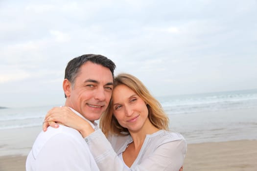 Couple embracing each other at the beach