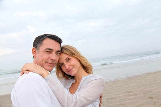 Couple embracing each other at the beach