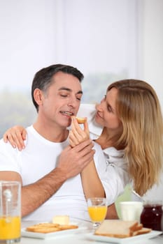Couple having breakfast during the week end
