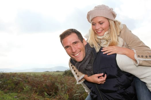 Closeup of happy family in fall season