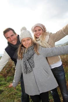 Closeup of happy family in fall season
