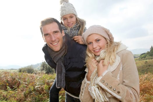 Closeup of happy family in fall season