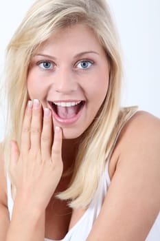 Beautiful blond woman on white background