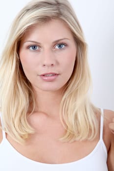 Beautiful blond woman on white background