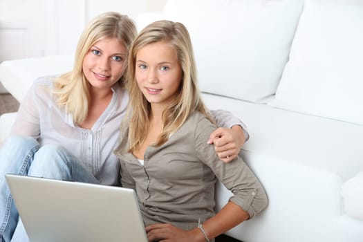 Woman and child surfing on internet