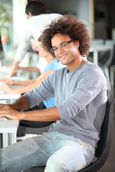 Closeup of college student in computer lab