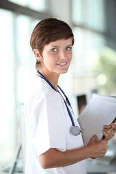 Closeup of beautiful young nurse at work
