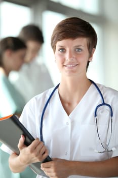 Closeup of beautiful young nurse at work