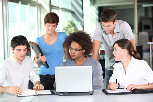 Group of young people in business meeting
