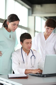 closeup of doctor and nurses in a meeting