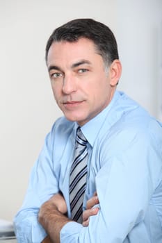 Closeup of businessman with blue shirt and tie
