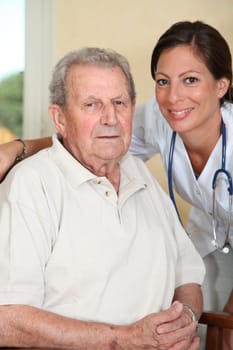 Elderly person with nurse