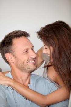Couple at home surfing on internet