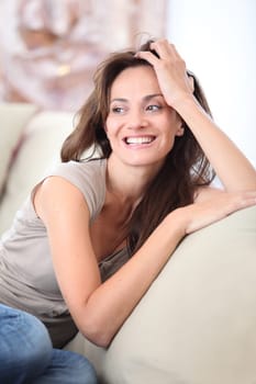 Closeup of beautiful woman relaxing at home