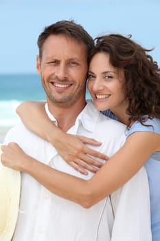 Couple walking on the beach