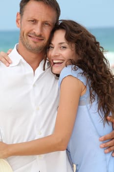 Couple walking on the beach