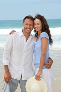 Couple walking on the beach