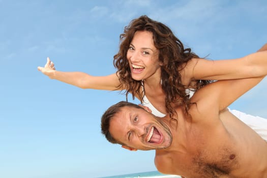 Couple having fun at the beach