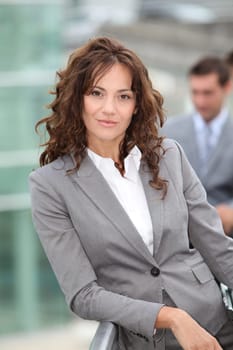 Businesswoman standing outside a building