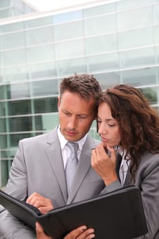 Business team meeting in front of building of offices