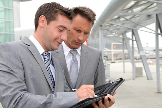 Businessmen in a business meeting away from the office