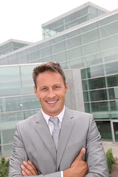 Portrait of businessman in grey suit