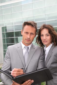 Business team meeting in front of building of offices