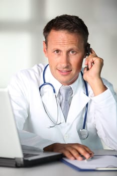 Closeup of doctor working in the office
