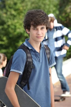Teenager with skateboard