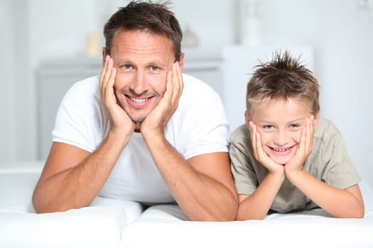 Closeup of father and son at home