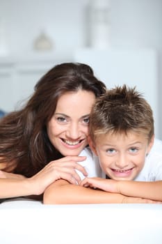 Mother and son having fun at home