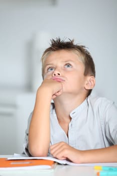 Little boy doing his homework