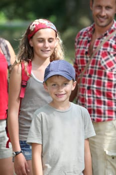 Happy family portrait on a hiking day
