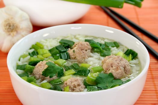 Rice soup with meatballs