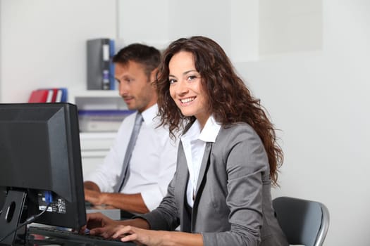 Businesswoman working on computer