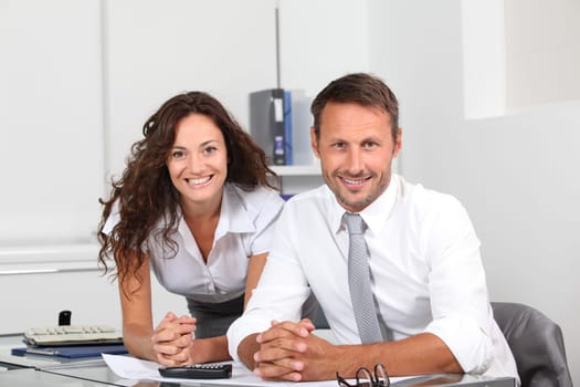 Business people in the office working on building project