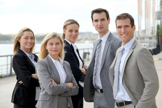 Group of business people standing outside a trade fair