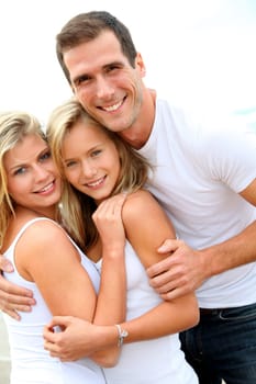 Portrait of happy family at the beach