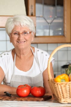 Elderly woman in kitchen