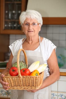 Elderly woman in kitchen