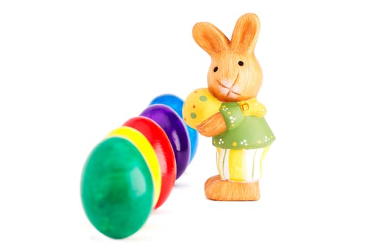 Little Easter bunny in front of deep row with o