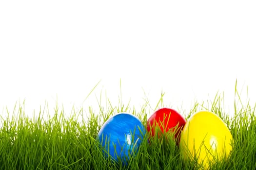 Red Blue And Yellow Easter Egg In Grass
