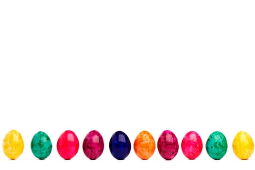 Long colorful row of Easter eggs
