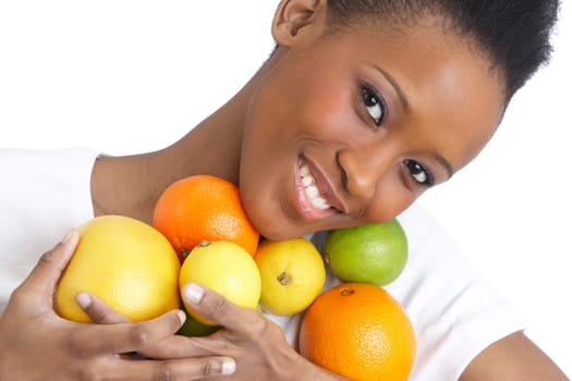 Young Woman Holding Citrus Fruit In Studio