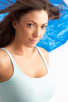 Portrait Of Attractive Young Woman In Studio
